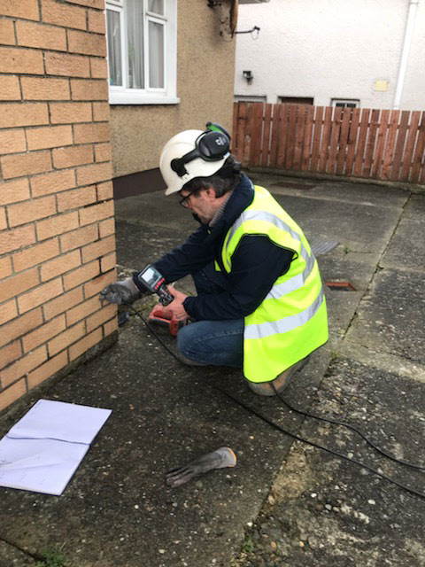 Dampness in a wall being analyzed